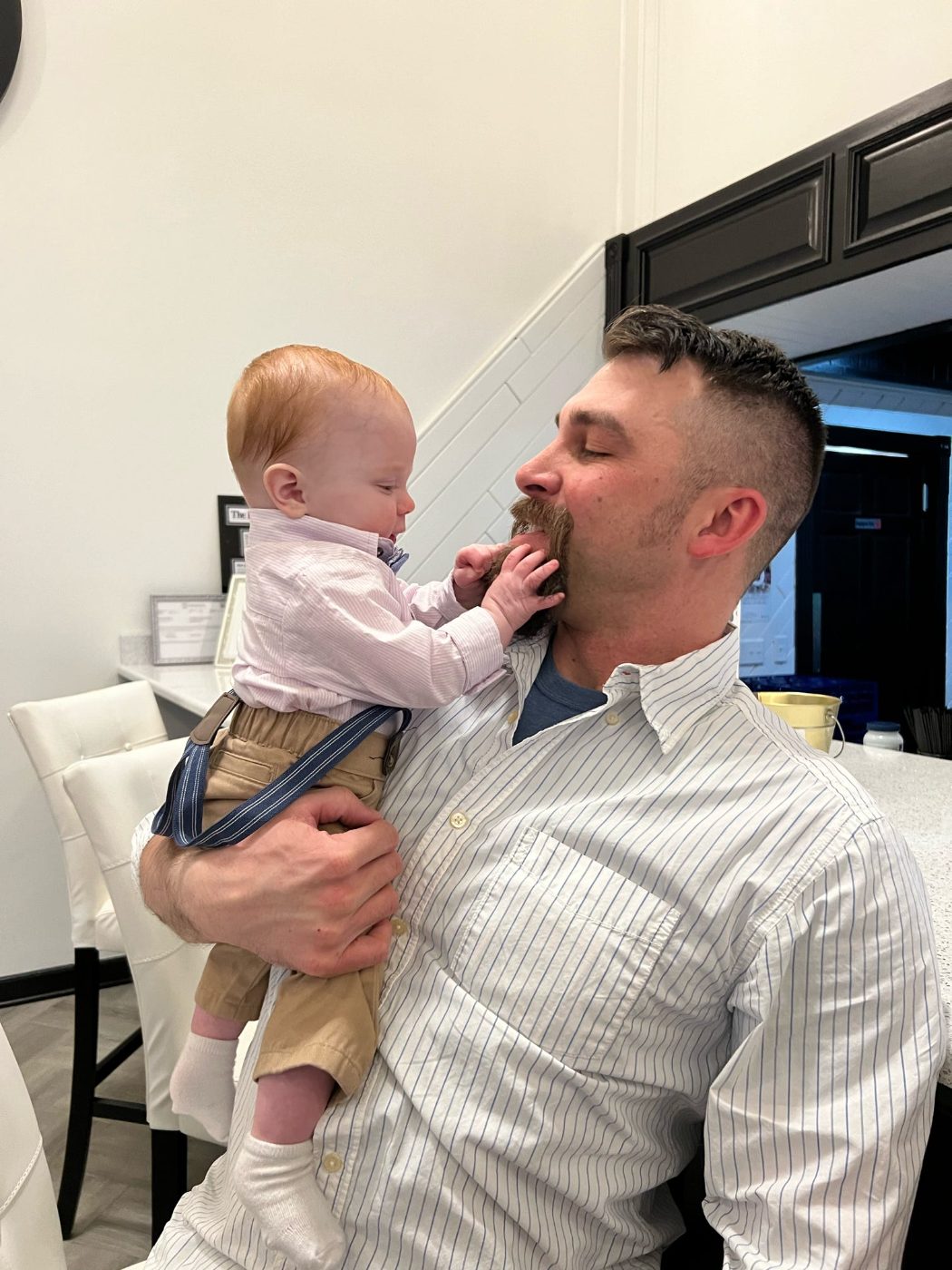 Rob with a baby